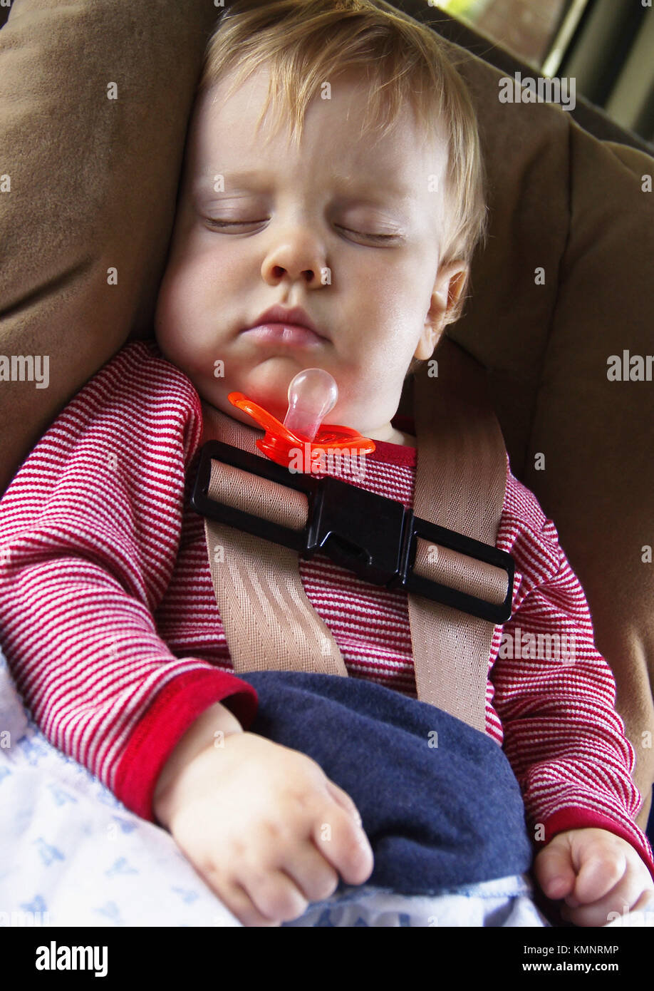 sleeping baby in car seat Stock Photo Alamy