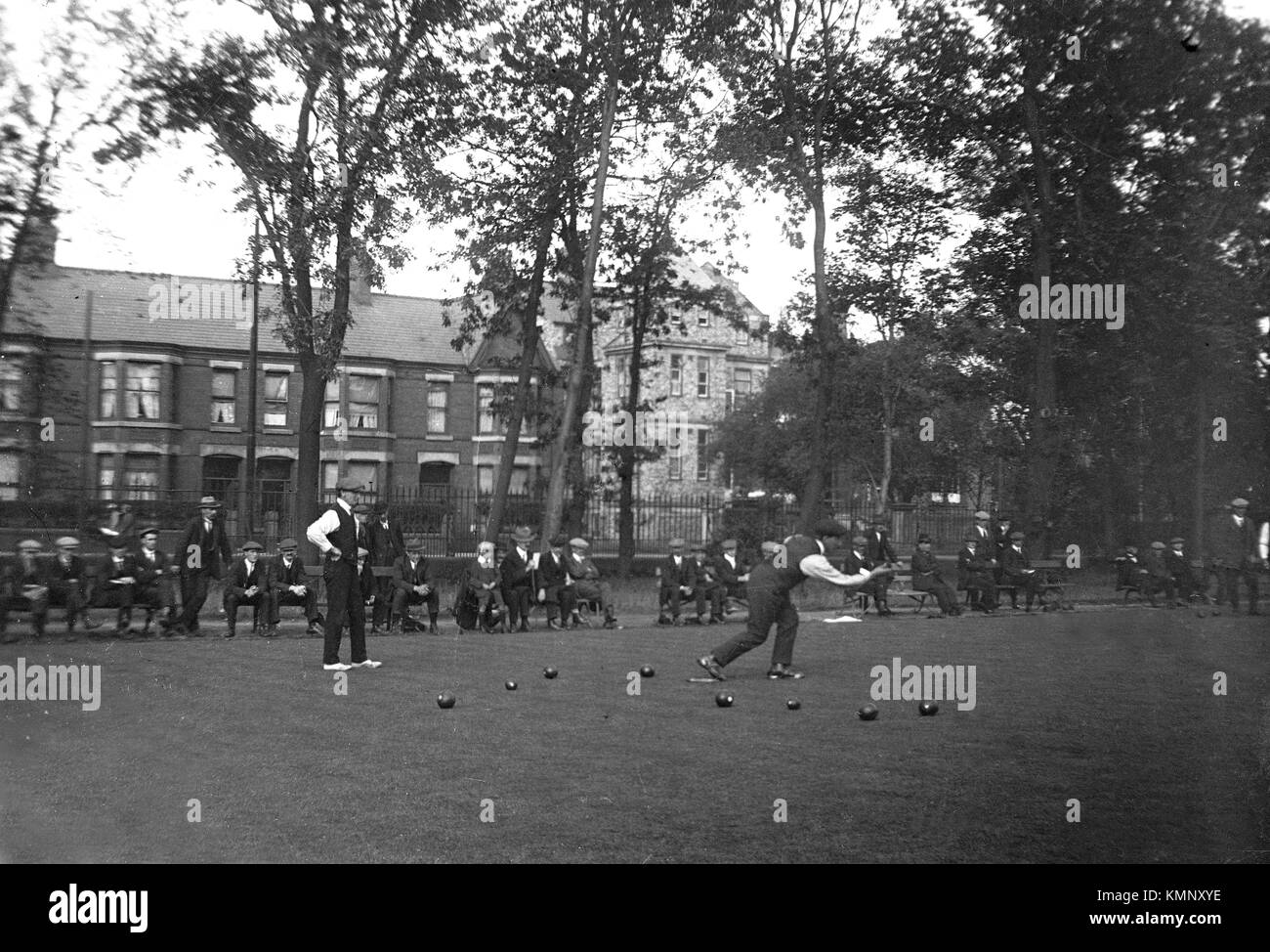 The scene as matches progress under the watchful eyes of spectators c1919 Crown Green Bowls, England.  Photo by Tony Henshaw Stock Photo