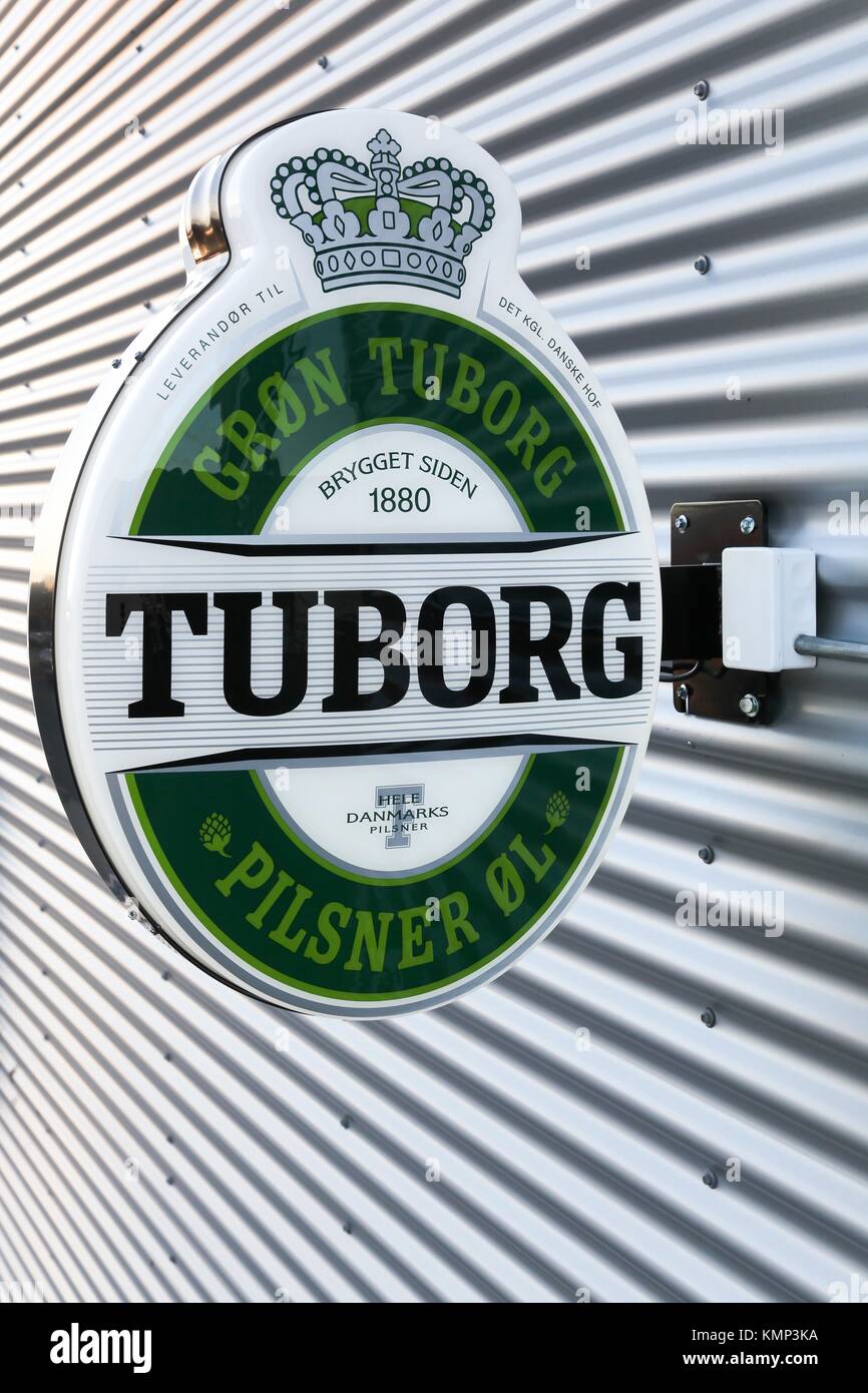 Risskov, Denmark - November 25, 2017: Tuborg beer logo on a wall. Tuborg is a Danish brewing company Stock Photo