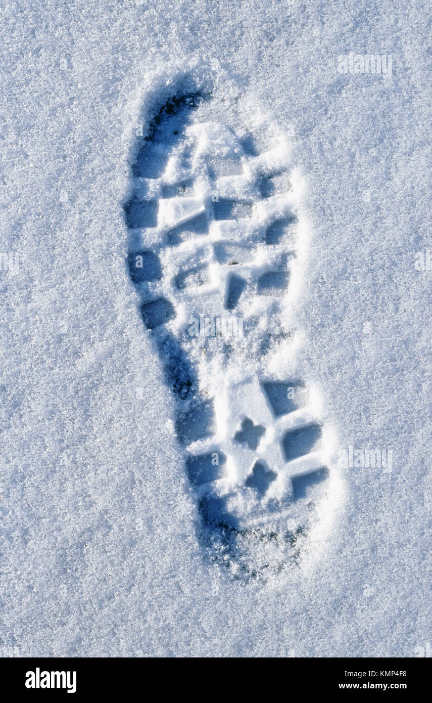 Left boot print in the snow Stock Photo Alamy