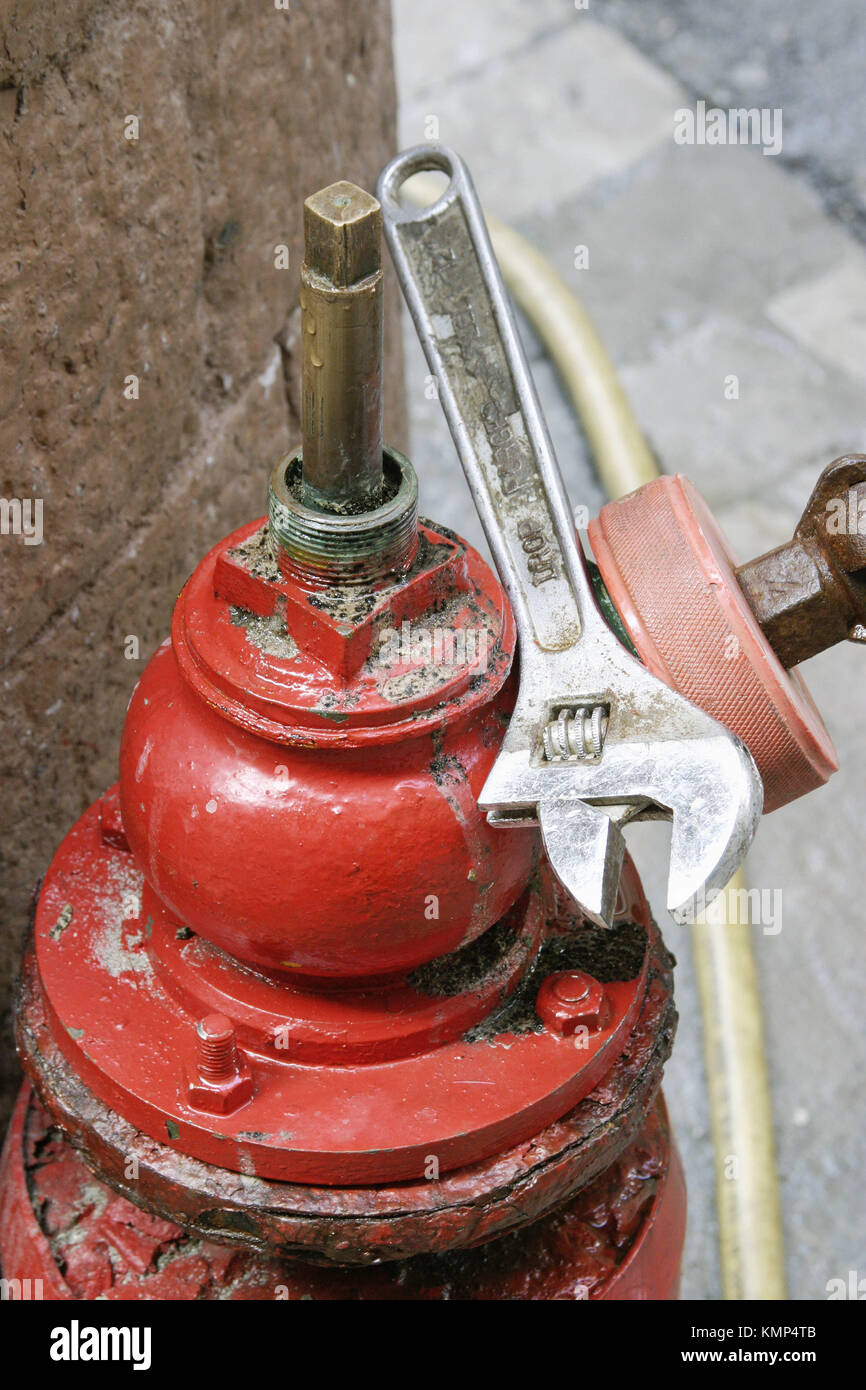 Shift spanner on fire hydrant Stock Photo Alamy