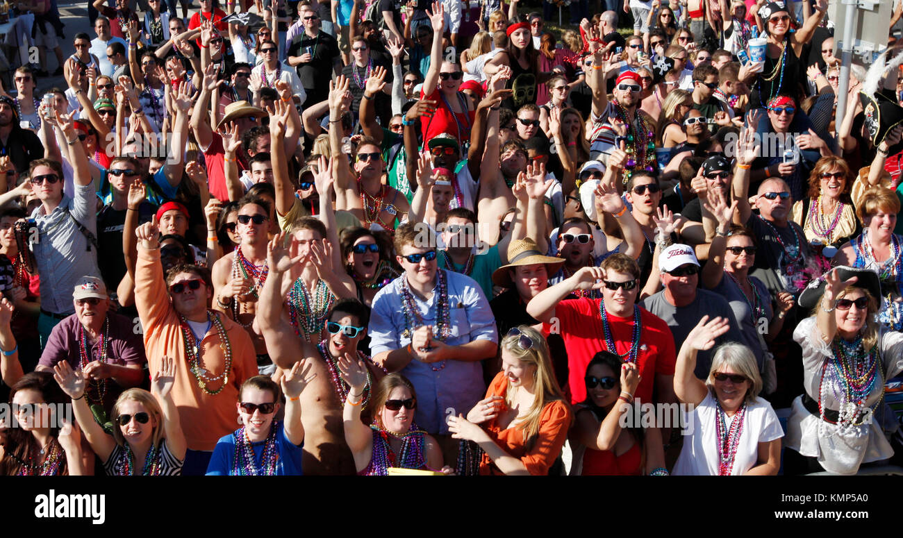 Crowds gather in Tampa Bay along Bayshore boulevard during Tampa's Gasparilla Pirate Invasion and Parade. Stock Photo