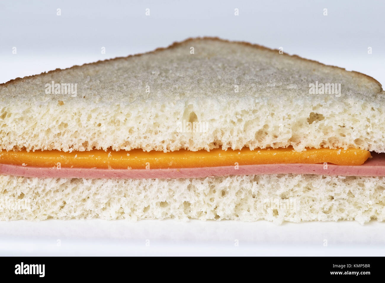 Whitebread, baloney & cheese sandwich Stock Photo Alamy