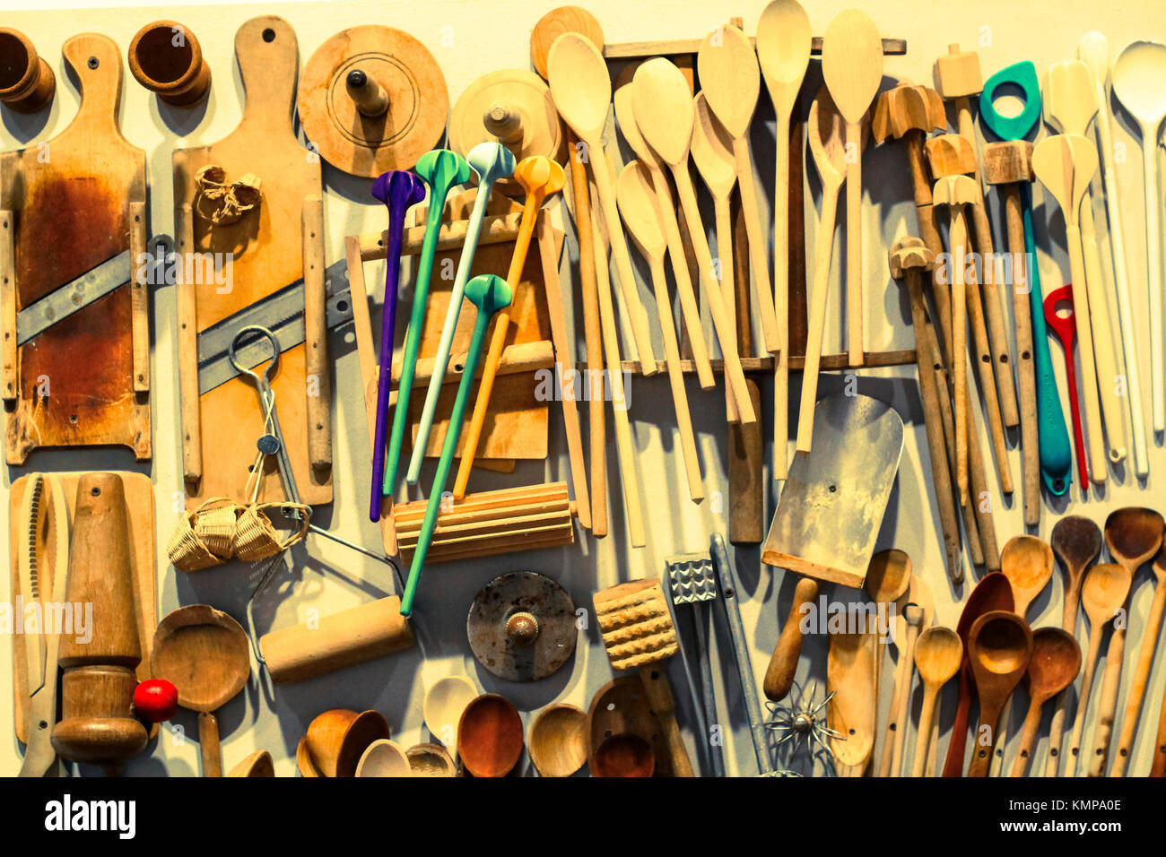 Several hanging kitchen utensils. Stock Photo