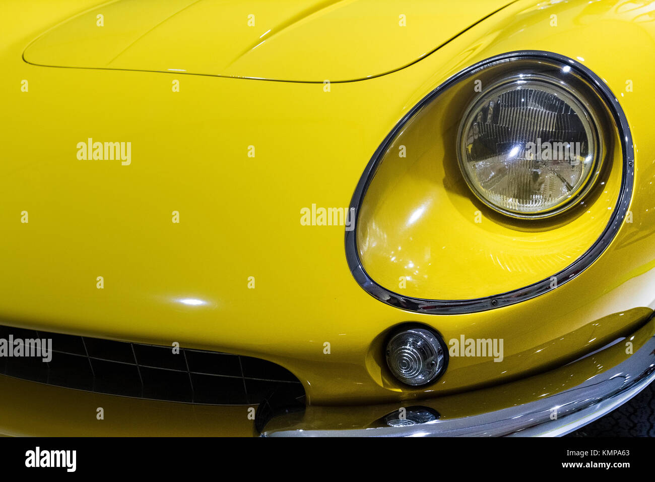 Bologna, BO, Italy - October 24, 2015: Detail of luxury sporty car duinng a vintage rally in Bologna  -- Body parts of a luxury sports car of yellow c Stock Photo