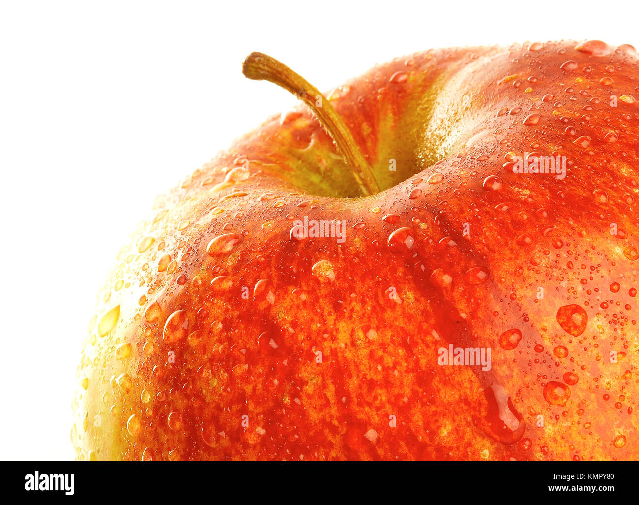 Fresh apple with drops of water. Stock Photo