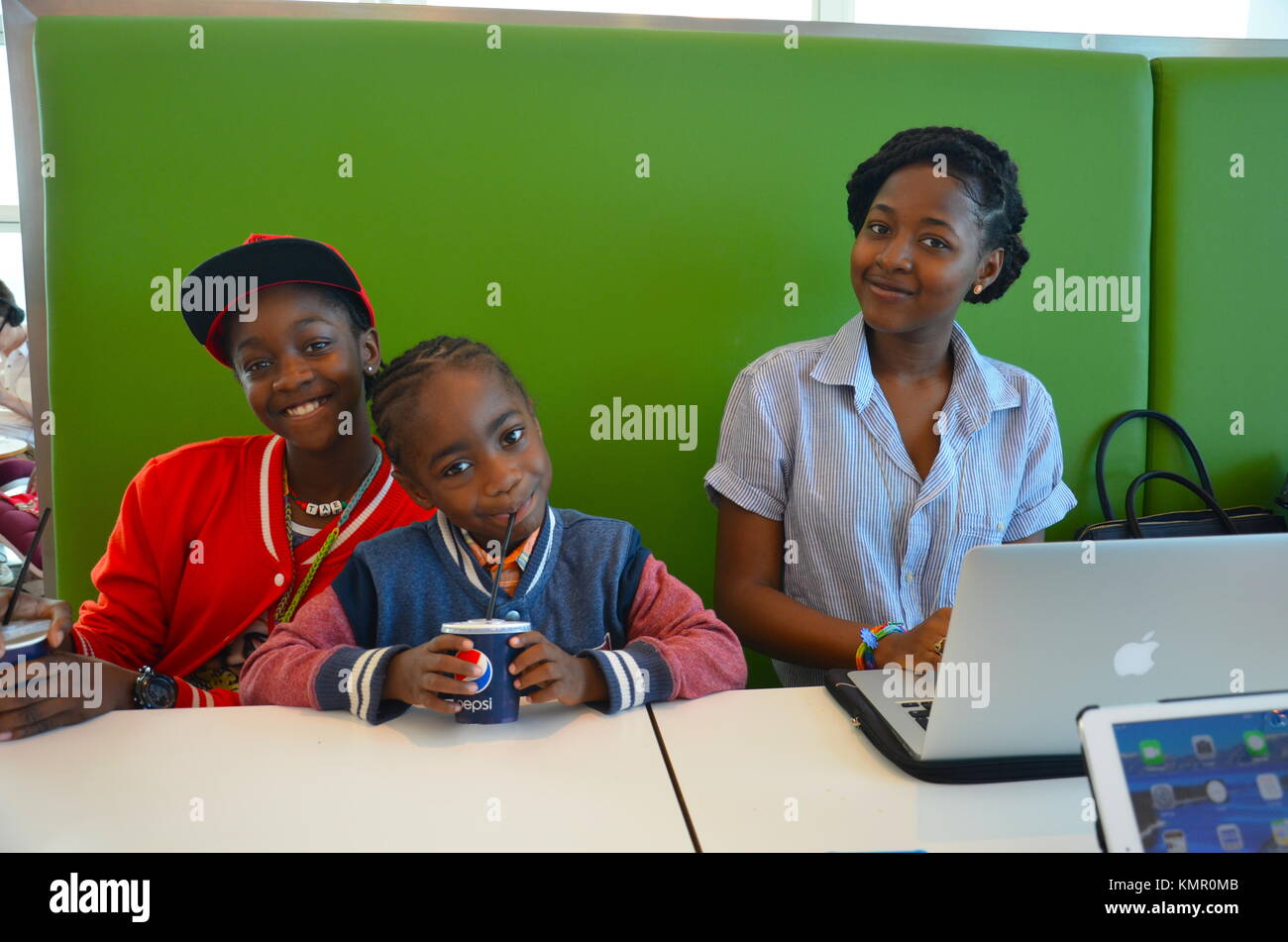 Afro Caribbean Family In The V Room At Gatwick Airport