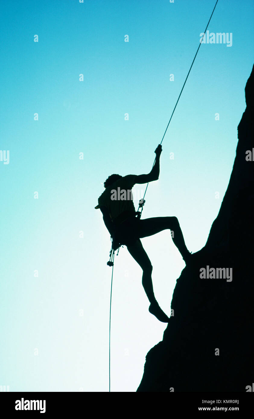 Man rappel sunset hi-res stock photography and images - Alamy