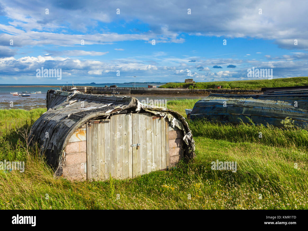 lindisfarne england lindisfarne upturned boats storage use lindisfarne island Holy Island Lindisfarne Northumberland England UK GB Europe Stock Photo
