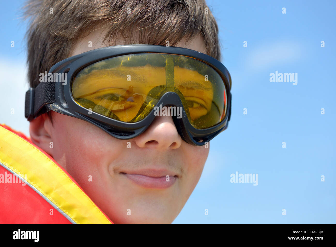 teen boy with goggles in nature Stock Photo Alamy