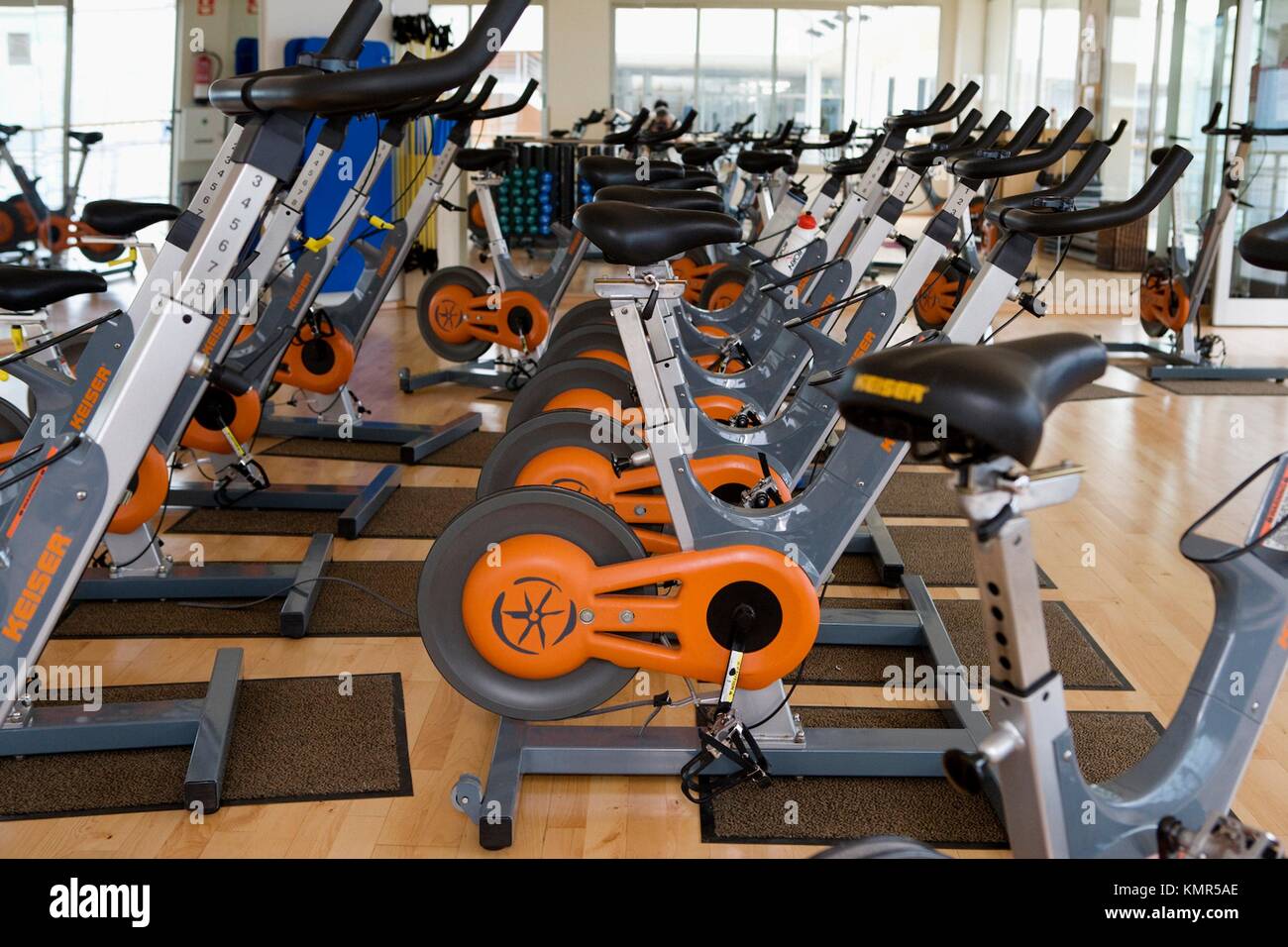 Spinning, training program for cardiovascular work and toning up in exercise bicycle, gym Stock
