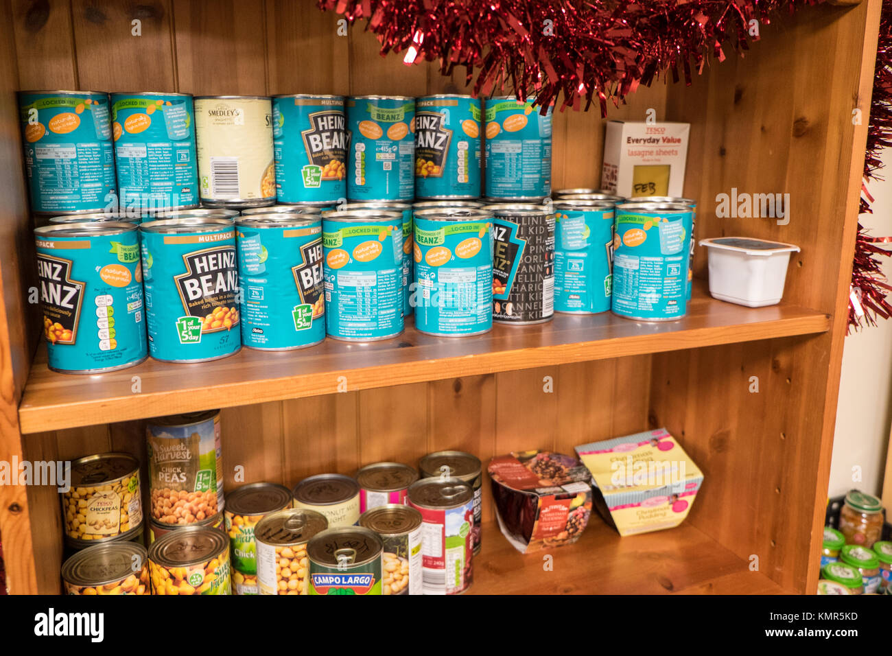 Donated,food,items,on,shelf,shelves,at Xcel,Food Bank,distribution,centre,Christian,charity,organisation,based,in,Carmarthen,Carmarthenshire,Wales,UK, Stock Photo