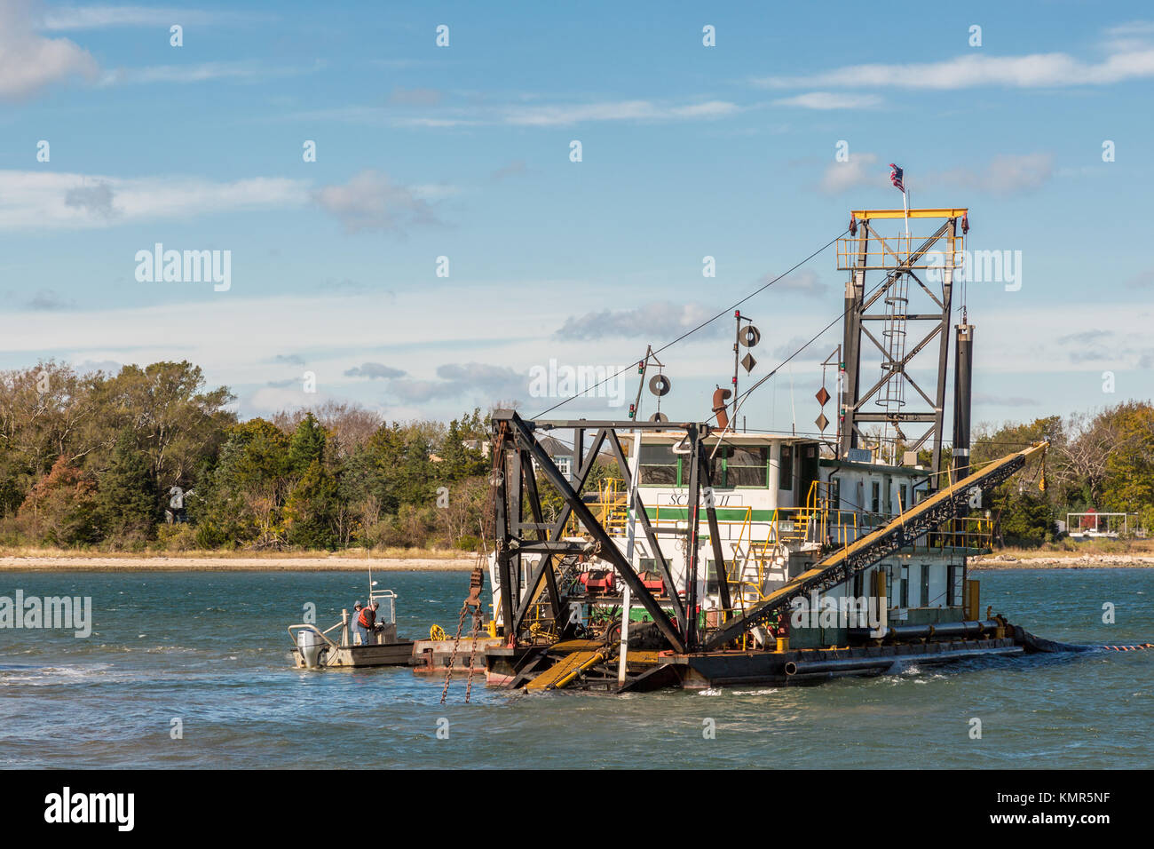 People working on boats off sag harbor's long wharf in sag harbor, ny, usa Stock Photo