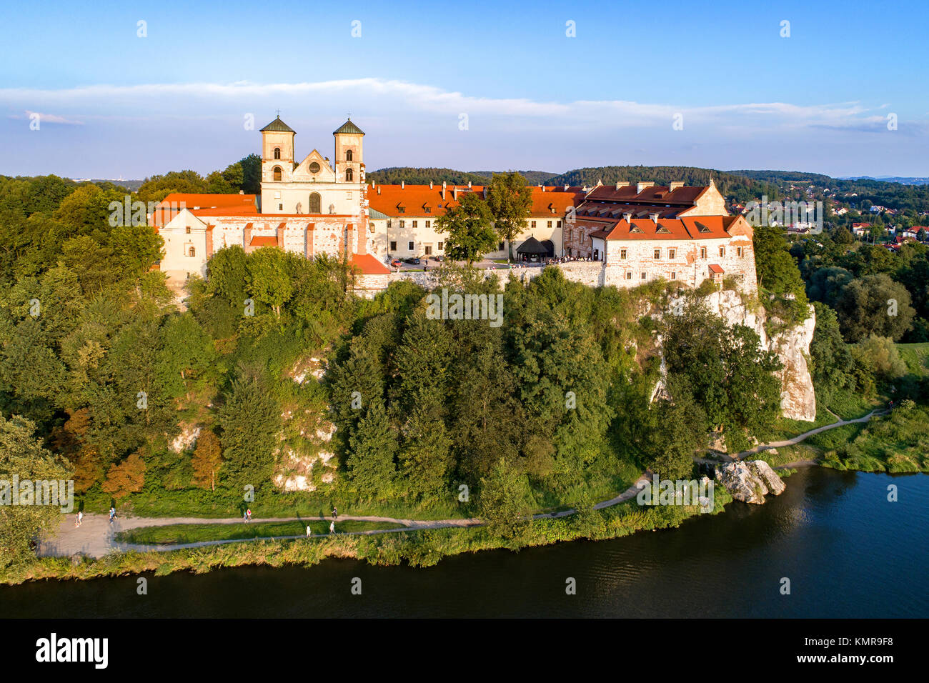 Benedictine monastery on the rocky hill in Tyniec near Cracow, Poland, and Vistula River. Aerial view at sunset Stock Photo