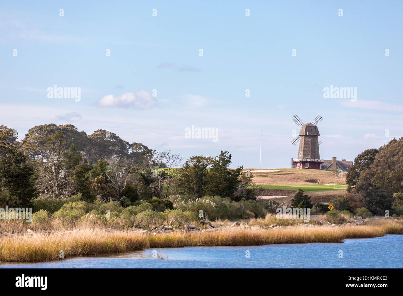 large windmill in a landscape at a southampton golf course in southampton ny Stock Photo