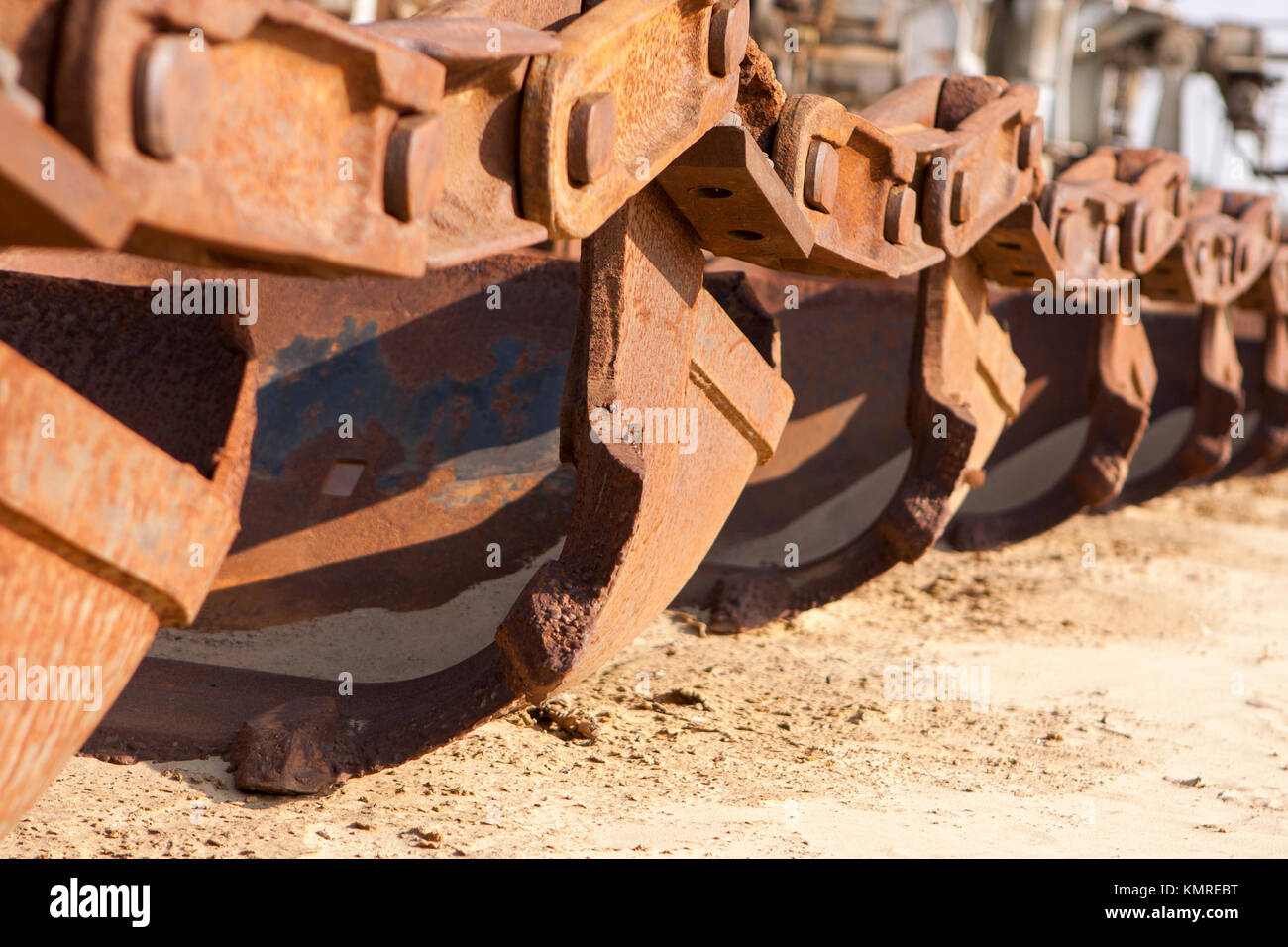 rusted buckets from giant career shovel Stock Photo