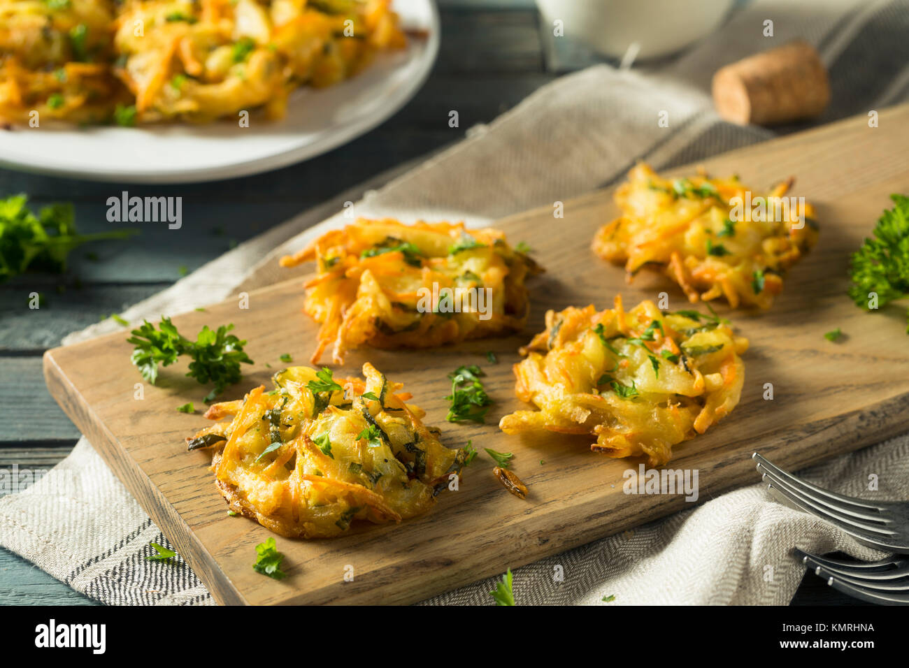 Homemade Fried Vegetable Birds Nests with Onion and Parsley Stock Photo