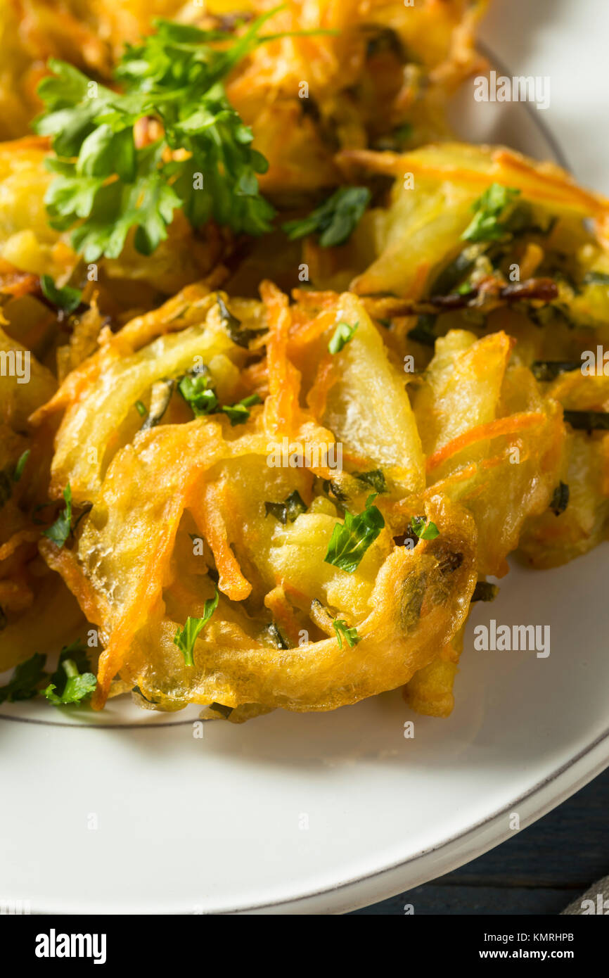 Homemade Fried Vegetable Birds Nests with Onion and Parsley Stock Photo