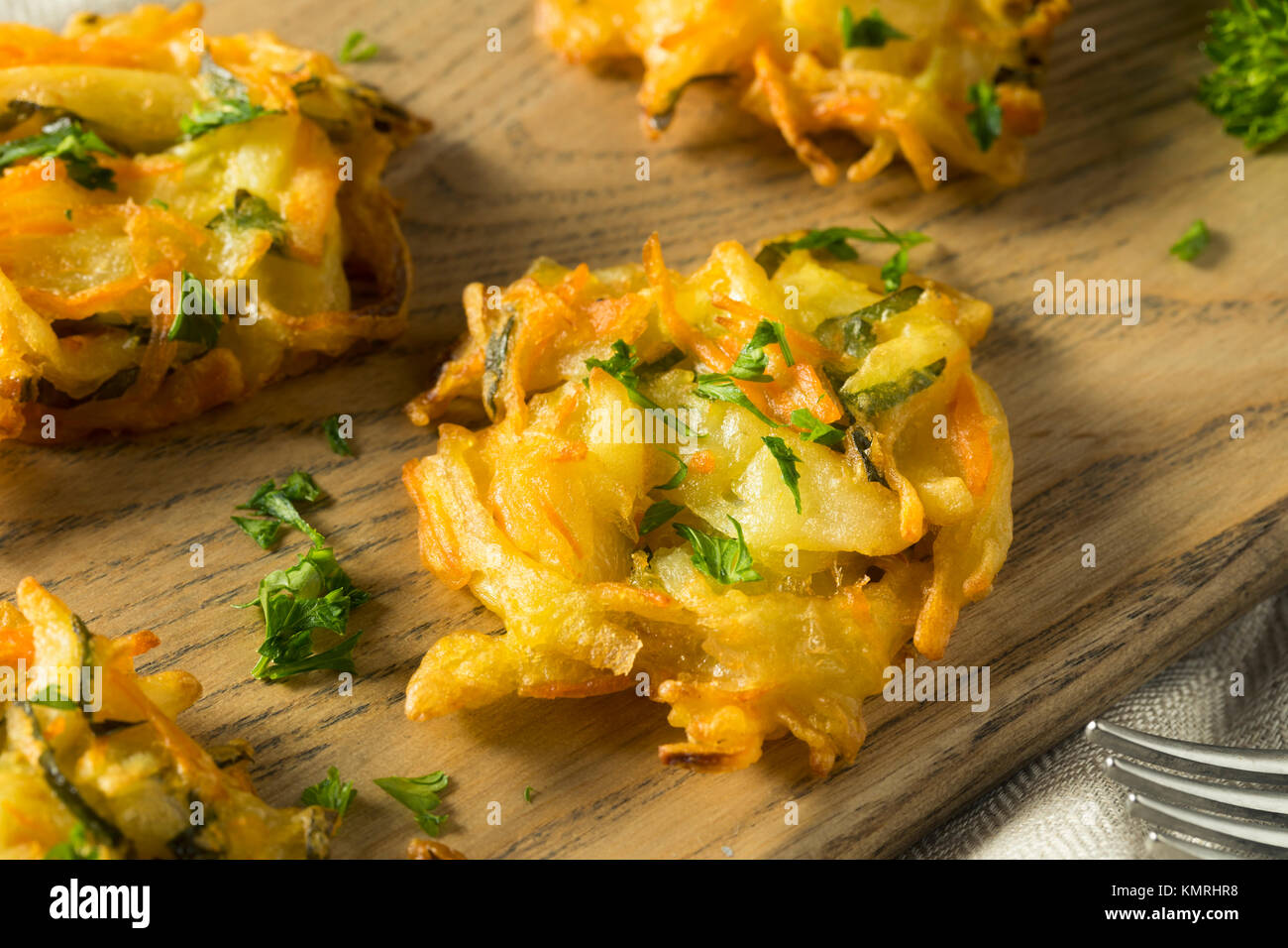 Homemade Fried Vegetable Birds Nests with Onion and Parsley Stock Photo