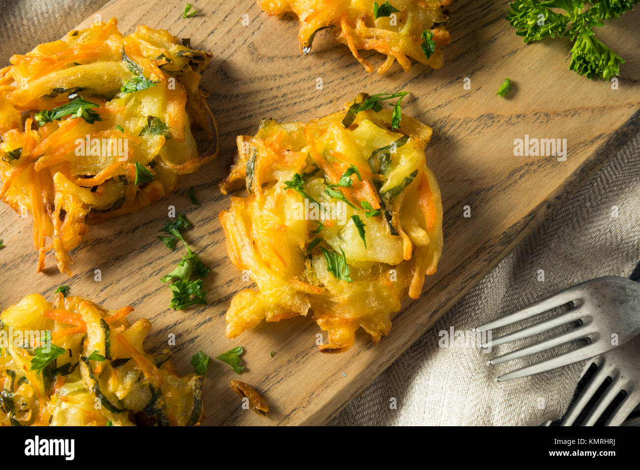 Homemade Fried Vegetable Birds Nests with Onion and Parsley Stock Photo