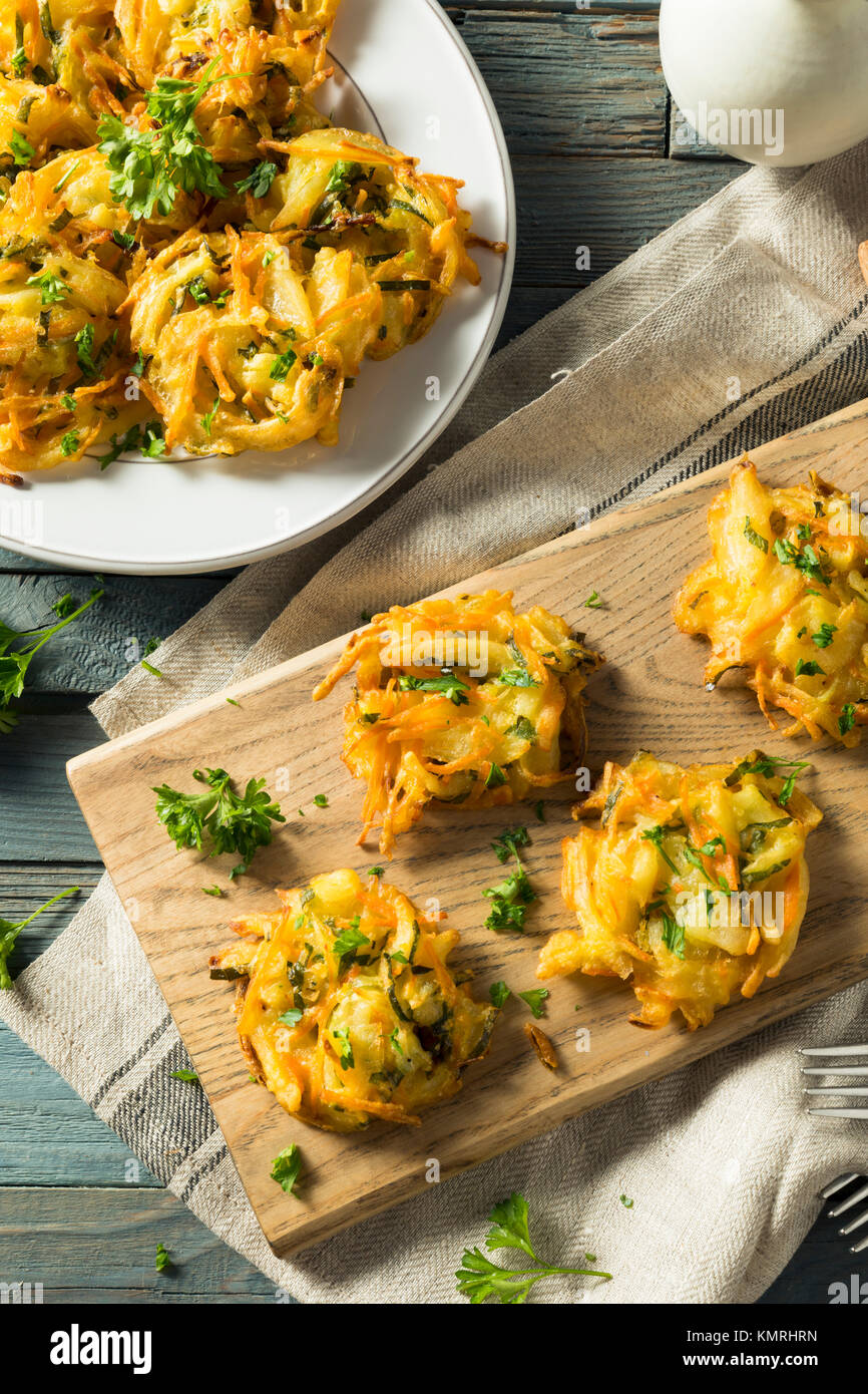 Homemade Fried Vegetable Birds Nests with Onion and Parsley Stock Photo