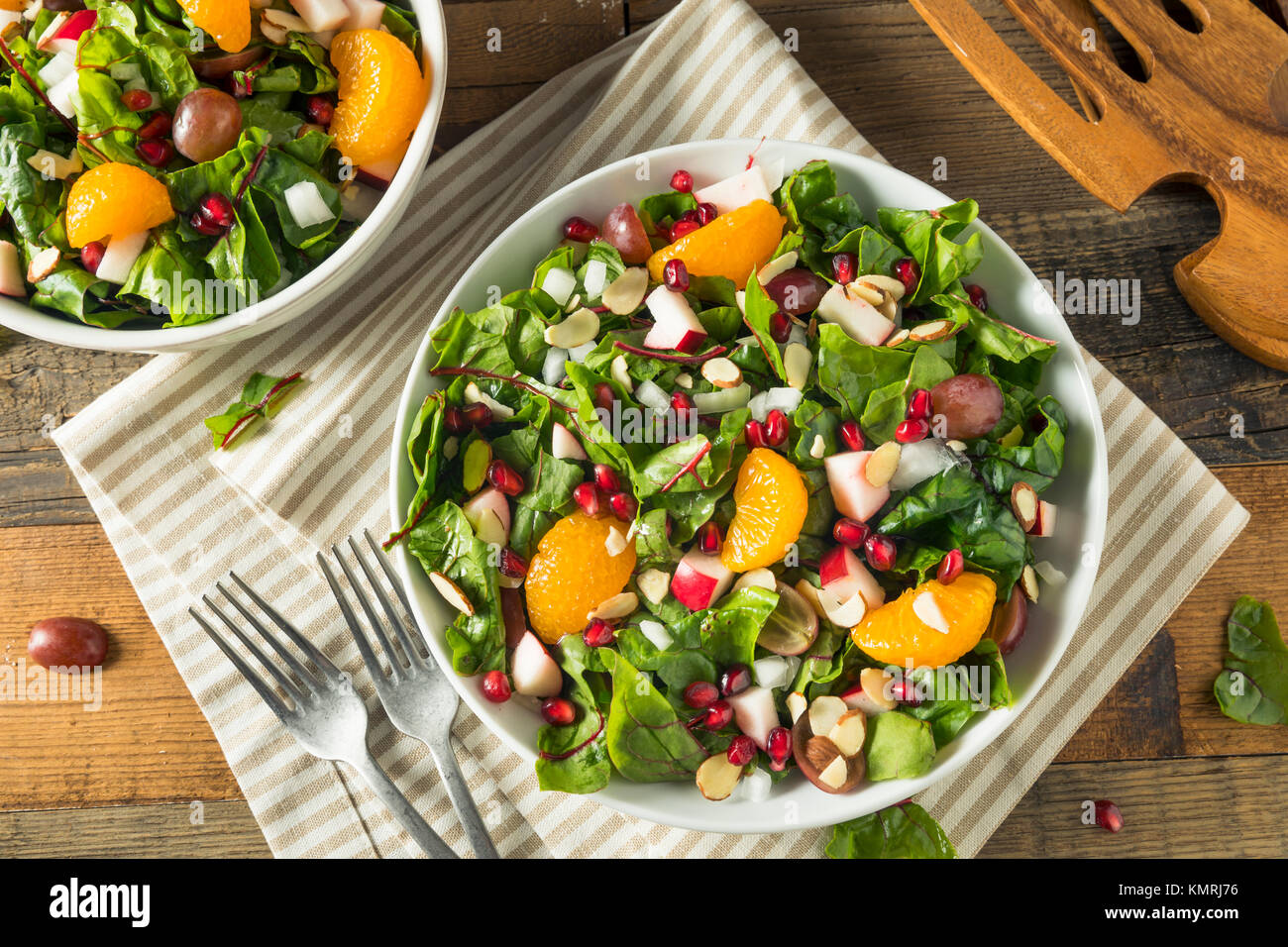 Raw Organic Winter Chard Salad with Oranges Almonds and Apples Stock Photo