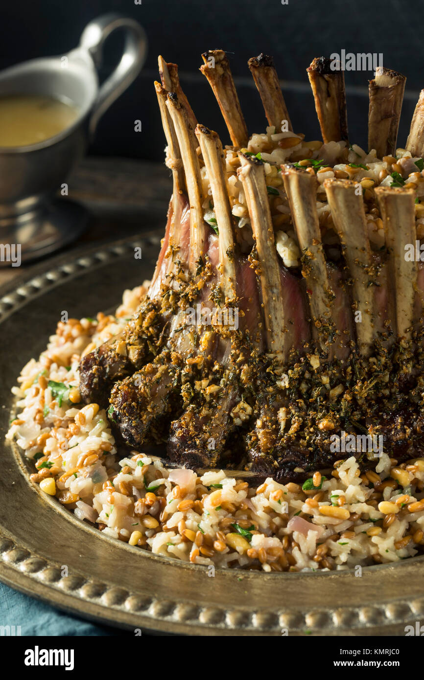 Homemade Gourmet Crown of Lamb with Rice Pilaf Stock Photo