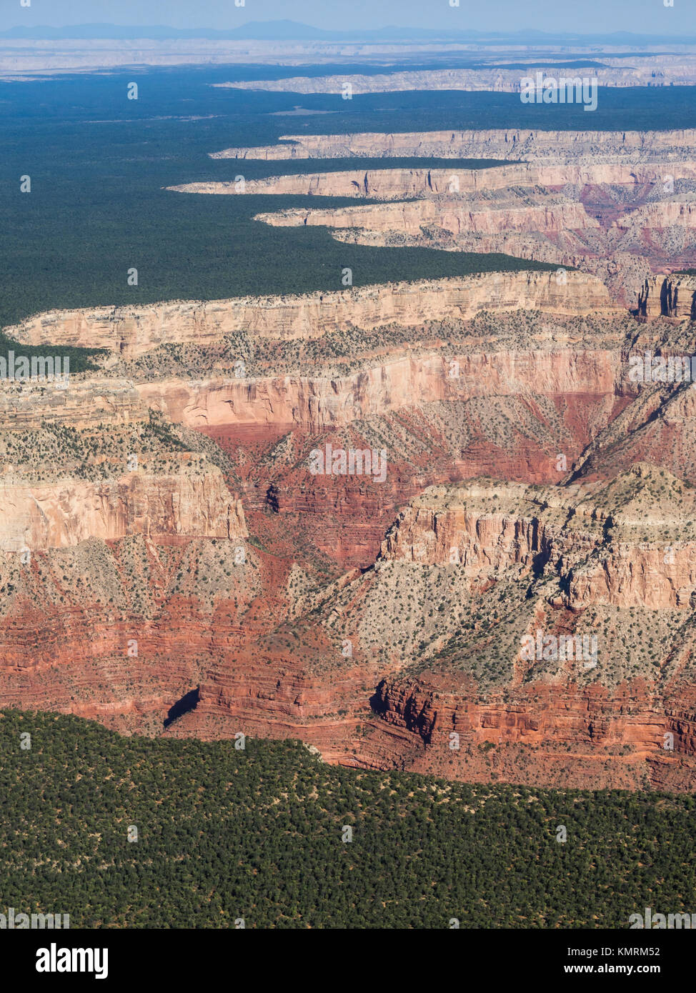 Aerial view onto the brim at the south rim of the Grand Canyon (USA), where the plains abruptly drop off into the canyon. Stock Photo