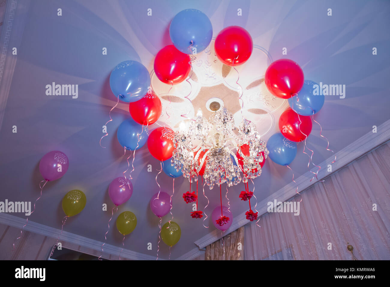 Colorful Balloons Floating On The Ceiling Of A Party In
