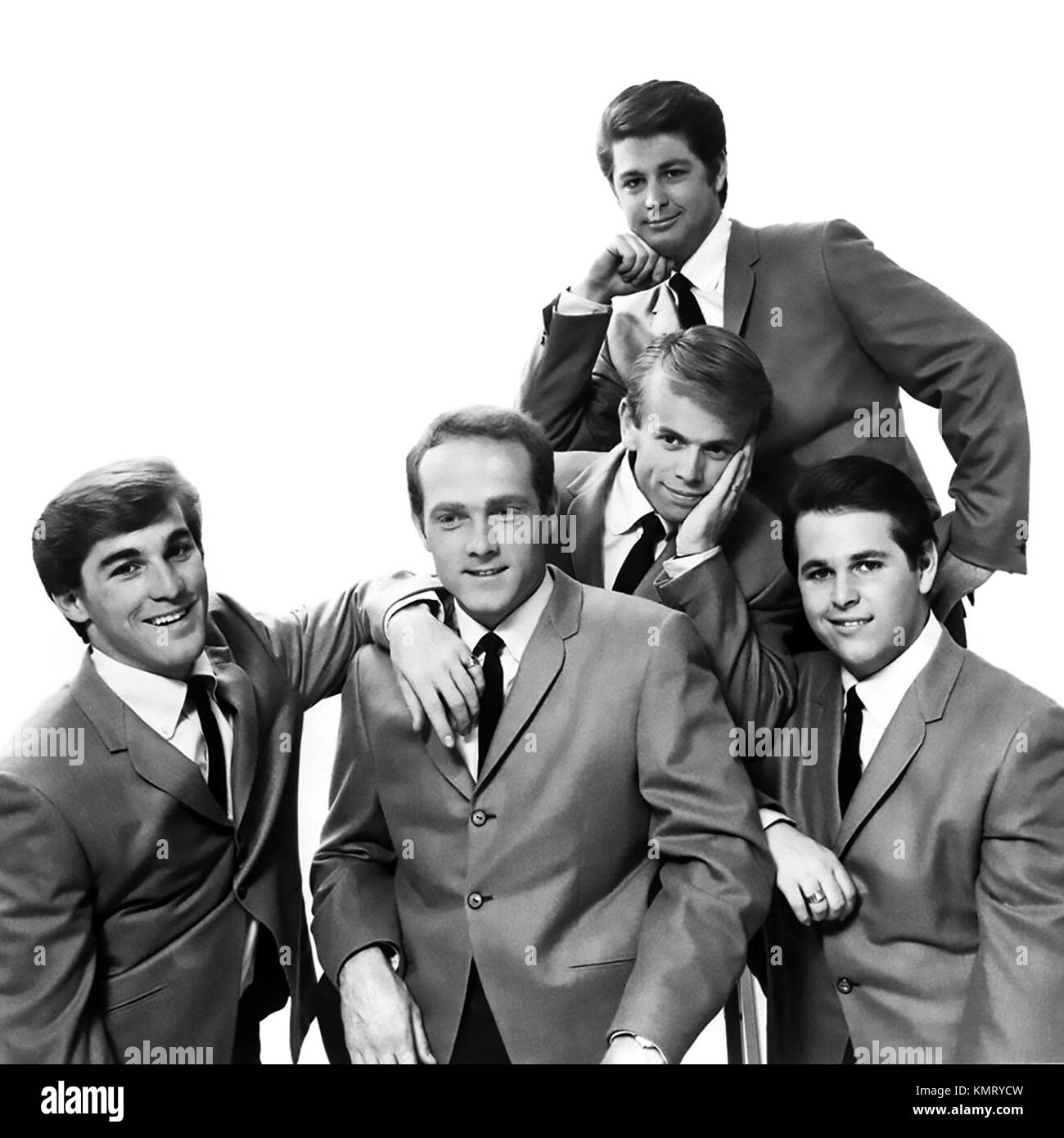 BEACH BOYS  Promotional photo of  US music group about 1964. From left: Dennis Wilson, Mike Love, Al Jardine, Brian Wilson (top), Carl Wilson Stock Photo
