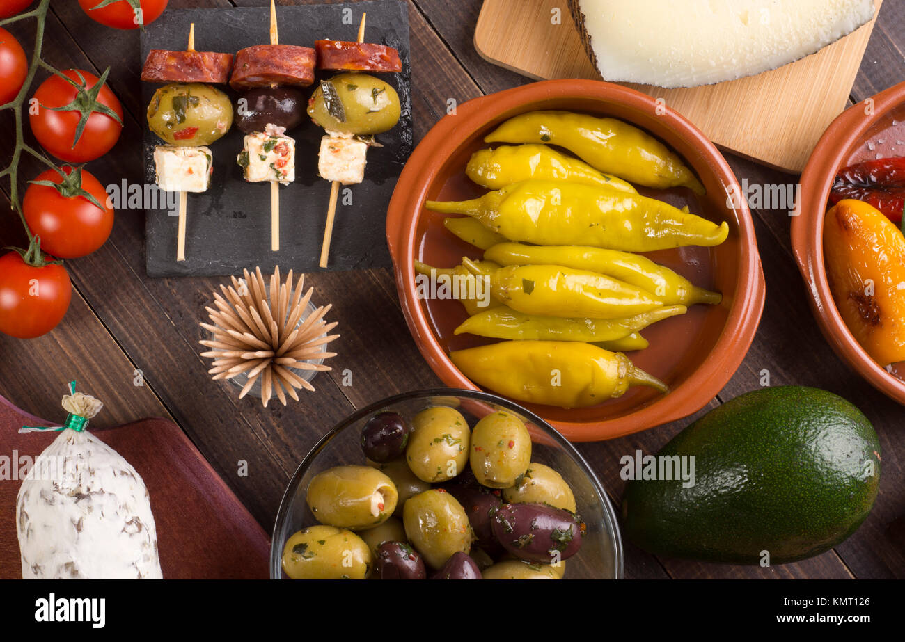 Sharing mixed spanish tapas starters on table. Top view Stock Photo Alamy