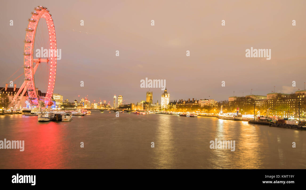 LONDON, UK - October 17th, 2017: BigBen, London eye and Thames river at night, England. Stock Photo