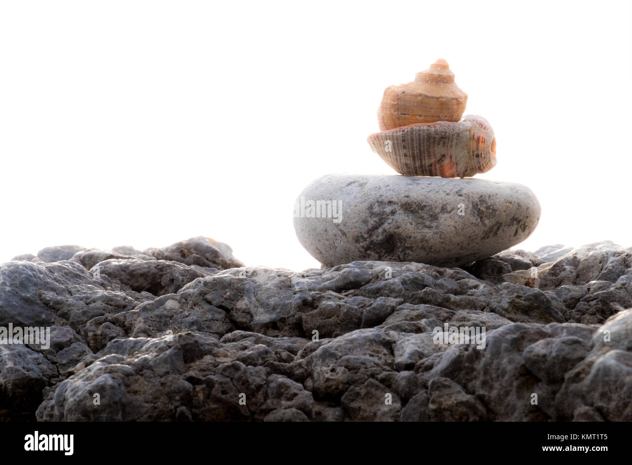 Stacked with a pyramid of shell and stones Stock Photo - Alamy