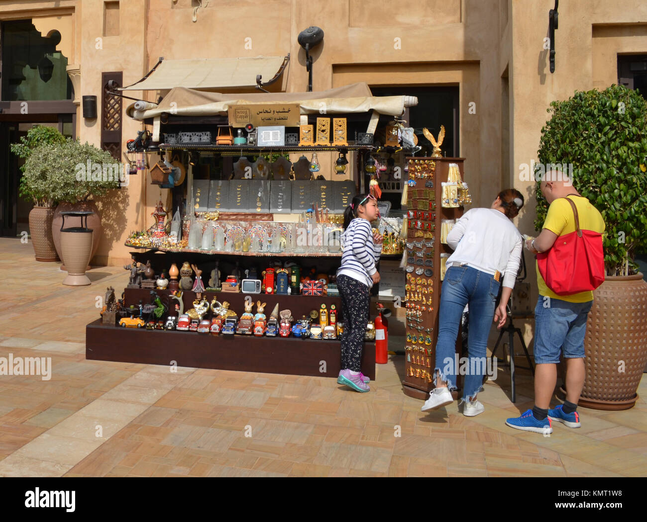 Family time shopping together for souvenirs in Dubai Stock Photo Alamy