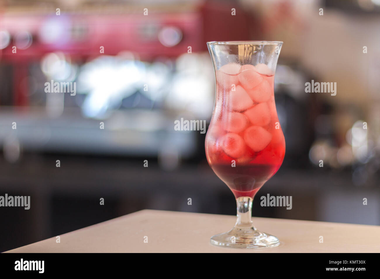 A glass of Italian Soda on a white table. Stock Photo