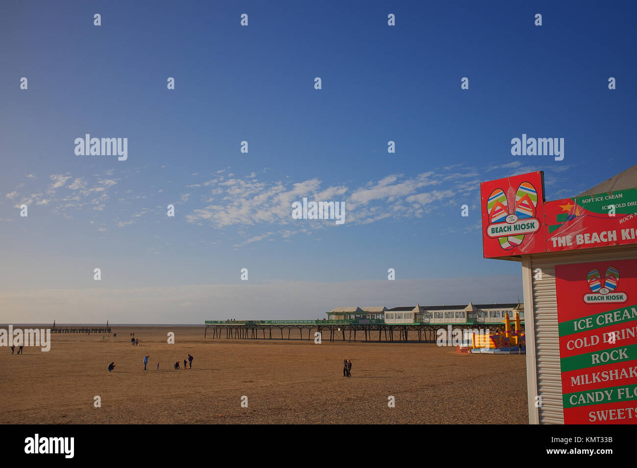 Lytham St Annes beach showing ice cream kiosk and pier Stock Photo