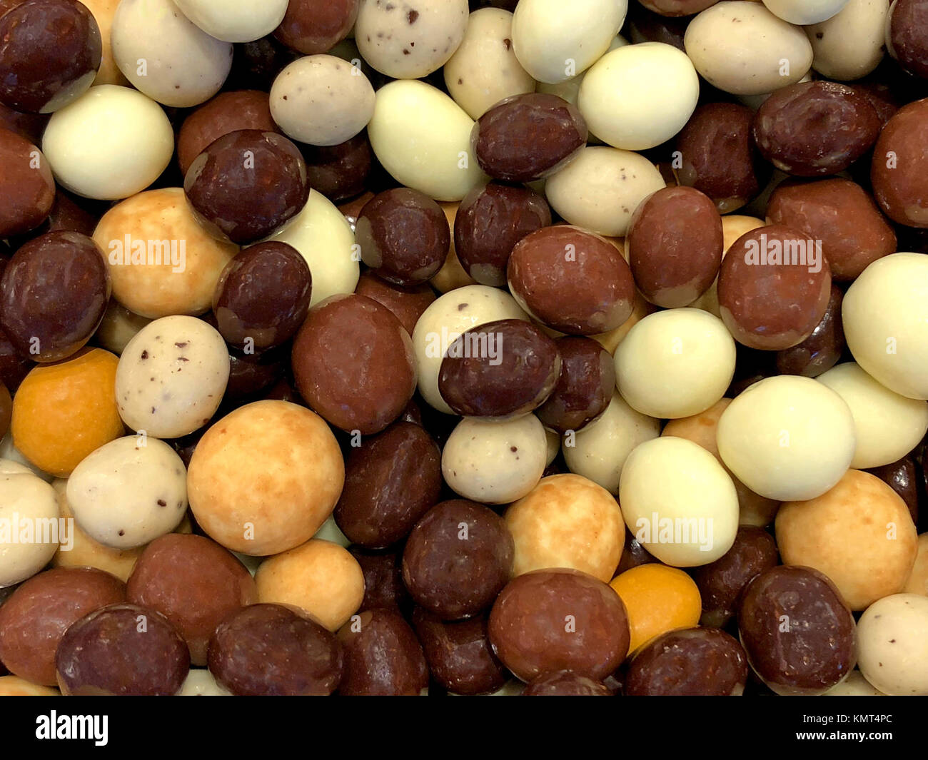 brown orange and white candy balls, expresso and coffee flavored treats