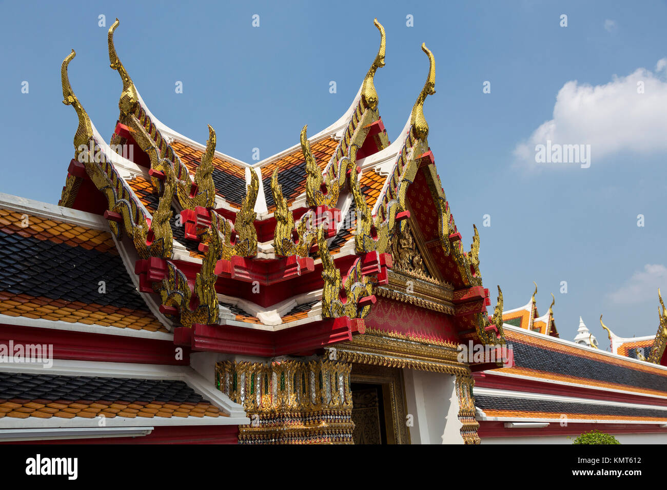 Bangkok, Thailand.  Thai Architecture, showing the chofa, the curling pointed extensions at each end that represent the Garuda, the vehicle of Vishnu. Stock Photo