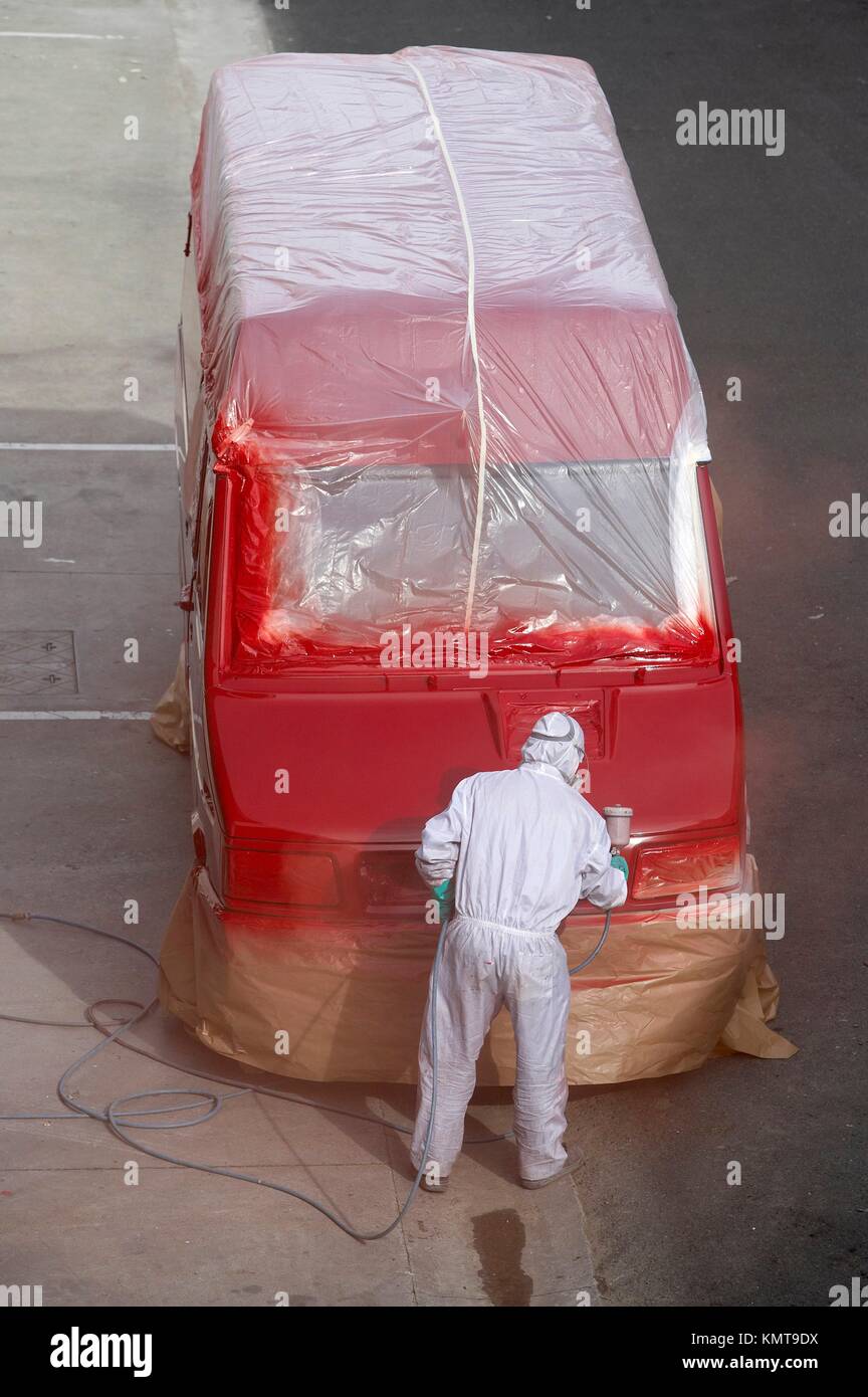 Painting with paint spray gun Stock Photo Alamy