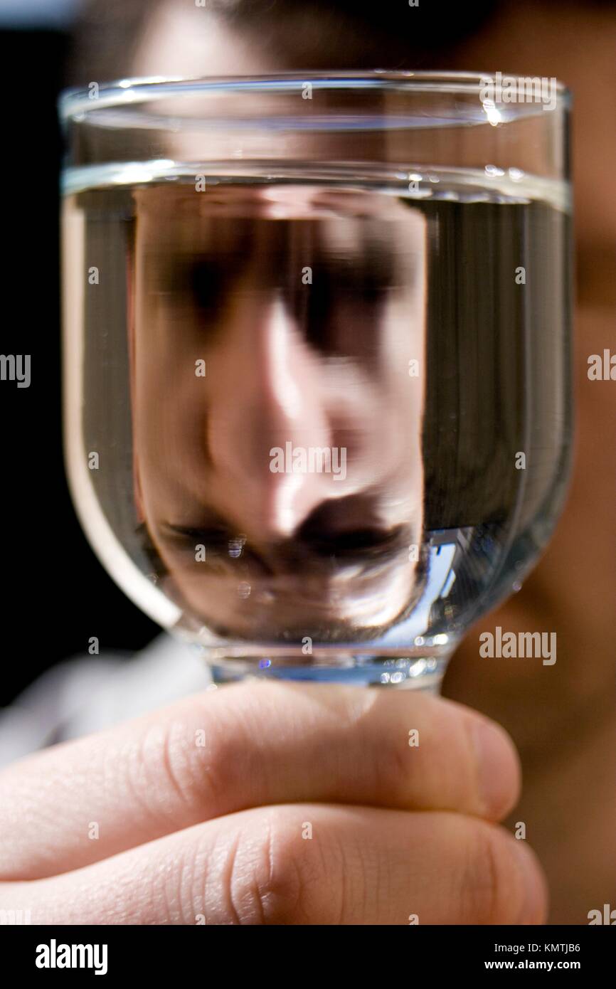 Man lifting a glass for a toast Stock Photo Alamy