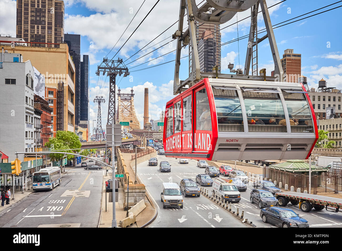 New York, USA - May 26, 2017: Cable car arrives at Manhattan station. The tram connects Roosevelt Island to the Upper East Side of Manhattan. Stock Photo