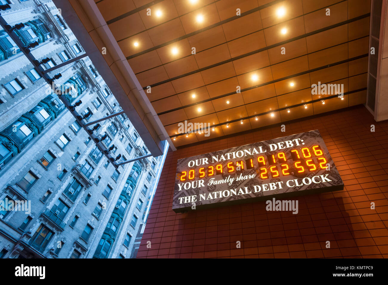 The National Debt Clock is seen at its new location in Anita's Way, a Privately Owned Public Space (POPS), off of Times Square in Midtown in New York on Friday, December 1, 2017. Real-estate mogul, the late Seymour Durst, created the clock on Feb. 20, 1989 to call attention to Reaganomics. The 'innards' of the clock were updated but the exterior was not redesigned. (© Richard B. Levine) Stock Photo