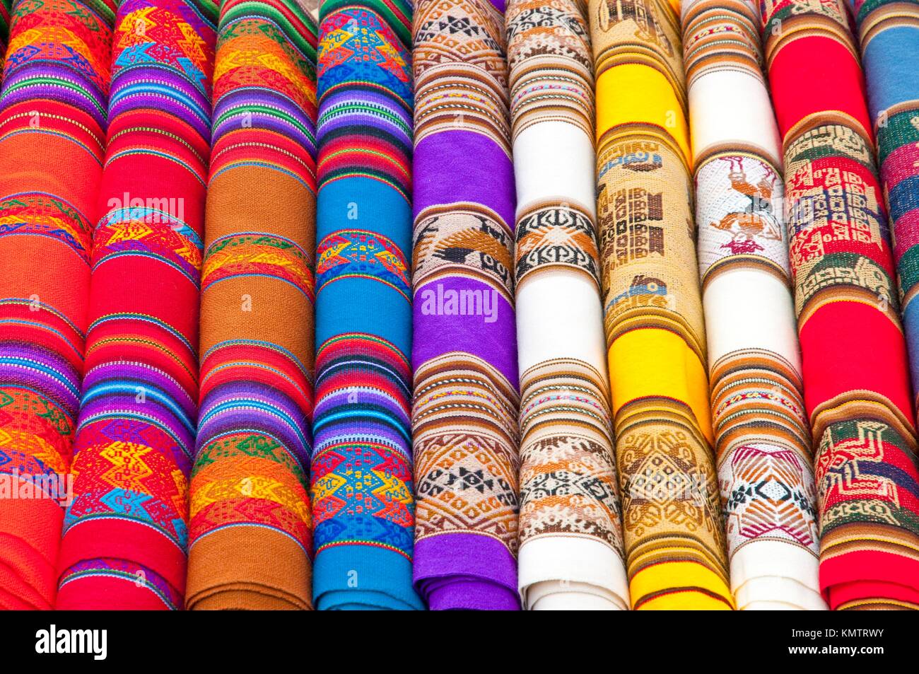 Closeup of traditional woven goods and textiles in the roadside markets of rural Peru, South America Stock Photo
