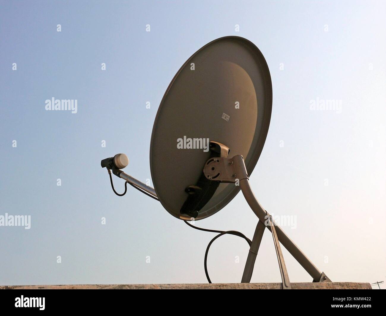 Dish antenna of a television set, India Stock Photo - Alamy