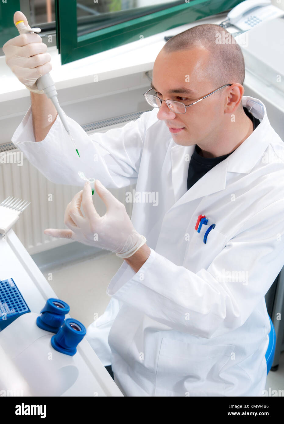 Young scientist works in the lab Stock Photo
