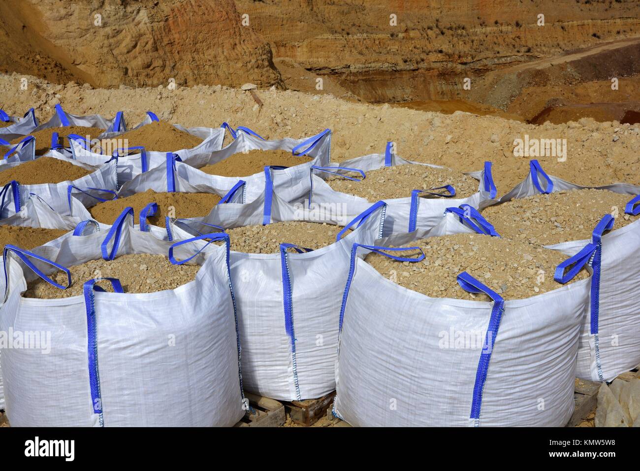 sandbag white big bag sand sacks quarry perspective Stock Photo Alamy
