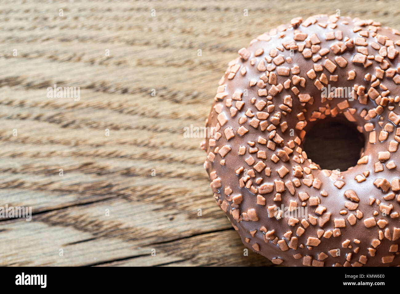 Chocolate donut on the wooden background Stock Photo - Alamy