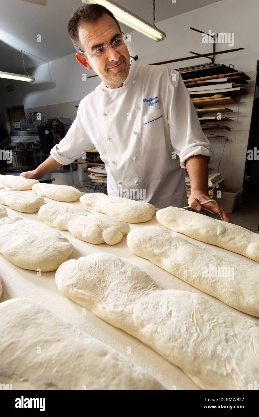 Baker prepares bread dough Stock Photo Alamy