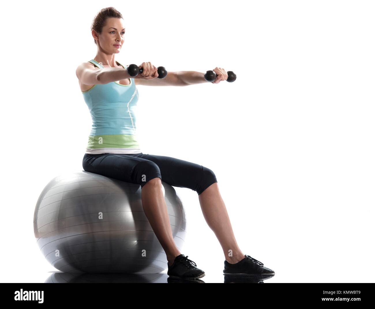 woman exercising workout on white background Seated Swiss Ball Lateral