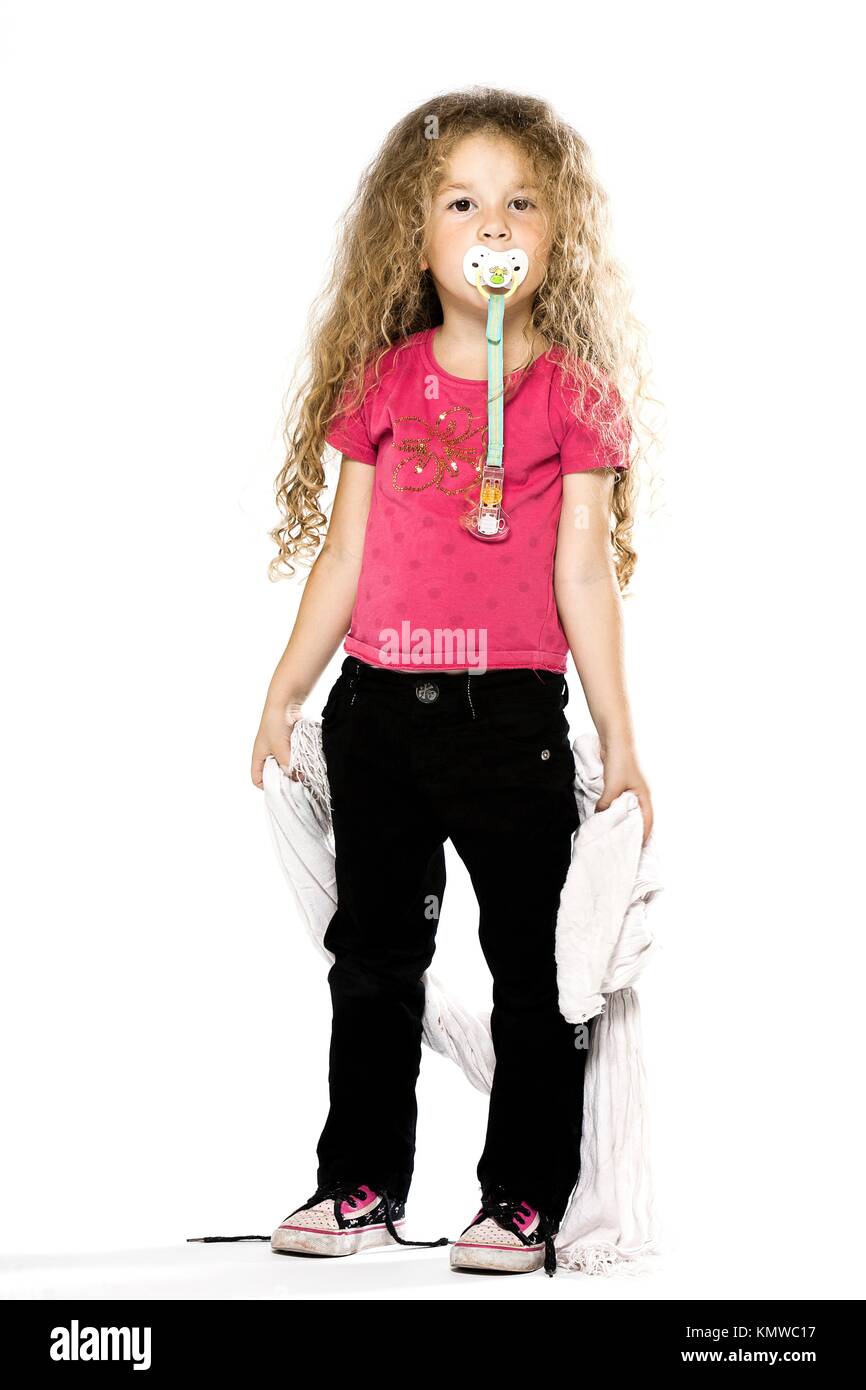 caucasian little girl holding blanket with pacifier isolated studio on